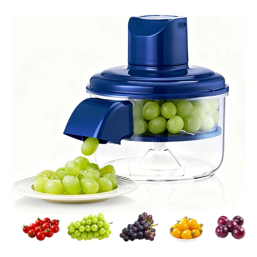 Pelador eléctrico automático con uvas en el recipiente transparente