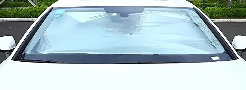 Parasol puesto, visto desde fuera del auto con su cara plateada